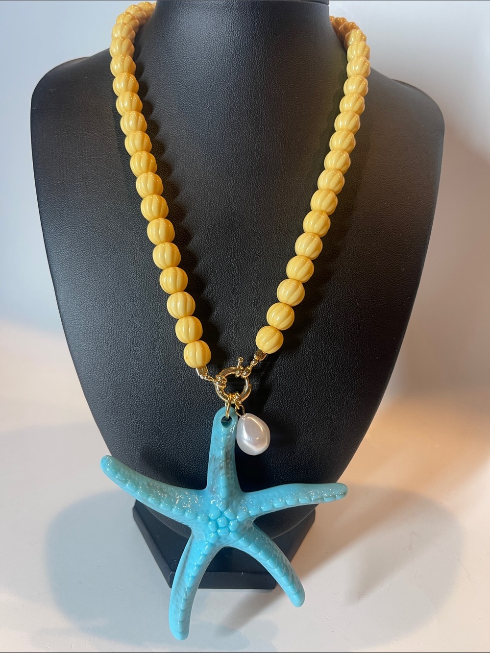 Yellow Beaded Necklace with Blue Starfish and Pearl Charm